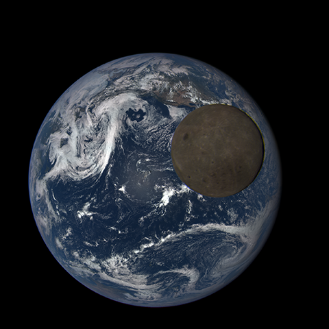 Real EPIC browse image: a gray-brown Moon crosses the upper-right portion of the sunlit Earth. A thin colored fringe follows the Moon’s right-hand edge.