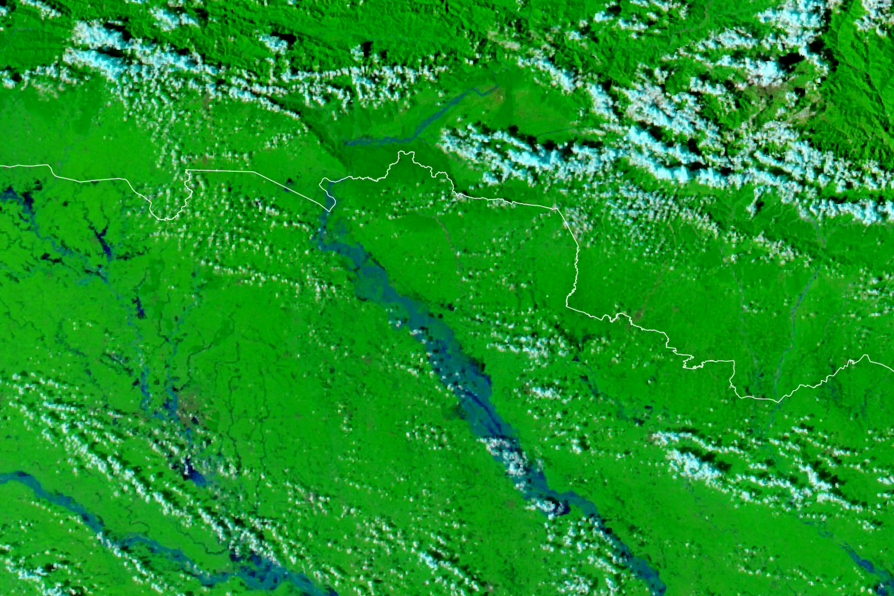 False-color Aqua MODIS image of the Gandak River region on September 29, 2026, showing a wider blue water corridor through green land, with scattered light-blue clouds.